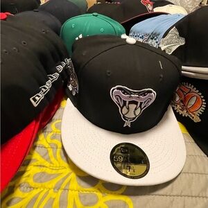 Black and White Cap with Snake Emblem